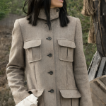 Celebrity Traitors Claudia Winkleman Grey Coat